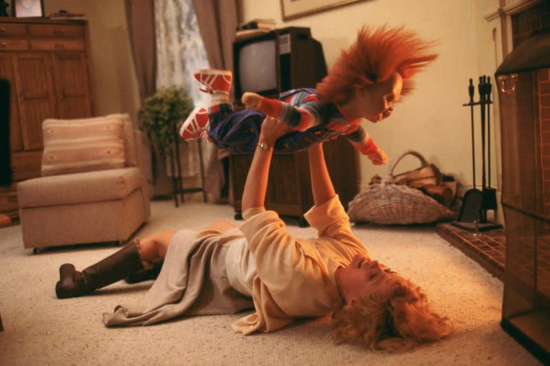 A drill motor made Chucky flail his arms and legs in this scene with Catherine Hicks. Photo courtesy of MGM