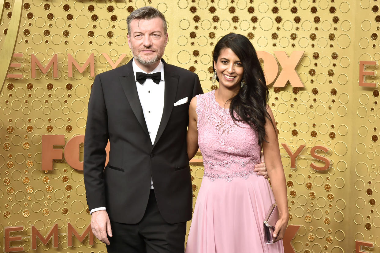 LOS ANGELES, CALIFORNIA - SEPTEMBER 22: (L-R) Charlie Brooker and Konnie Huq attend the 71st Emmy Awards at Microsoft Theater on September 22, 2019 in Los Angeles, California. (Photo by David Crotty/Patrick McMullan via Getty Images)