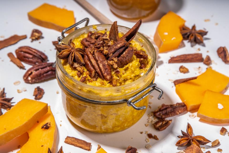 Pumpkin pie oatmeal with yogurt and pecan nuts