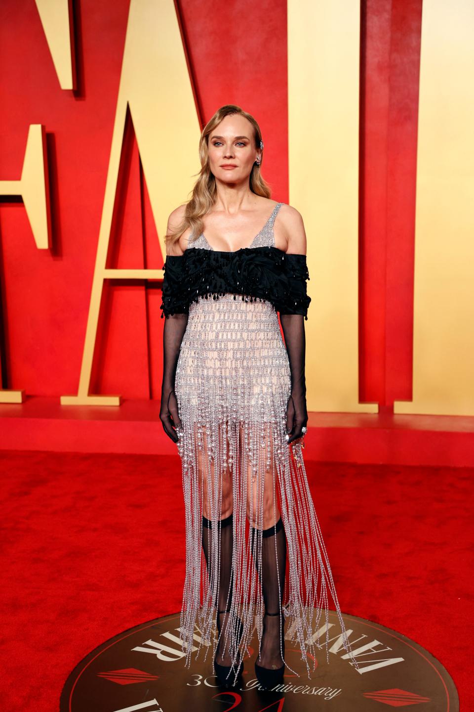 Image may contain: Diane Kruger, Fashion, Adult, Person, Premiere, and Standing