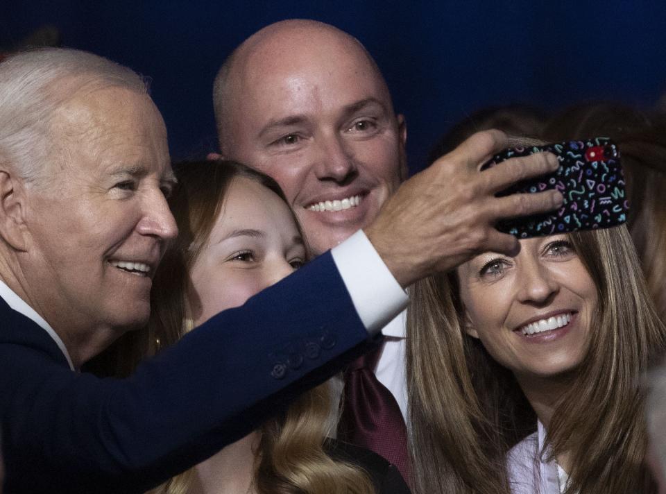 President Joe Biden takes a photo with Emma Kate Cox, Gov. Spencer Cox and first lady Abby Cox after speaking at the George E. Wahlen Department of Veterans Affairs Medical Center in Salt Lake City on Thursday, Aug. 10, 2023. | Laura Seitz, Deseret News