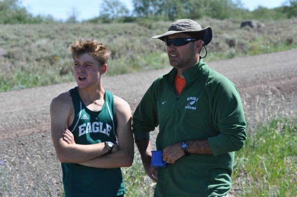 Greg Harm, right, coached his son Gabe, left, on both the Eagle High cross country and track teams.