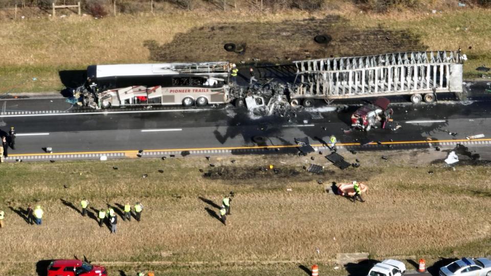 An aerial view of the aftermath of a fiery, five-vehicle crash Tuesday morning on Interstate 70 westbound in Etna that killed six people, including three students aboard a charter bus from Tuscarawas Valley Local Schools and three chaperones in an SUV accompanying the bus. There were 18 others injured.