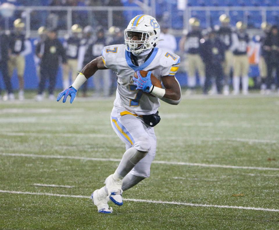 Cape Henlopen's Maurki James gets room on a reception to open the scoring in the first quarter of the DIAA Class 3A state championship against Salesianum at Delaware Stadium, Friday, Dec. 1, 2023.