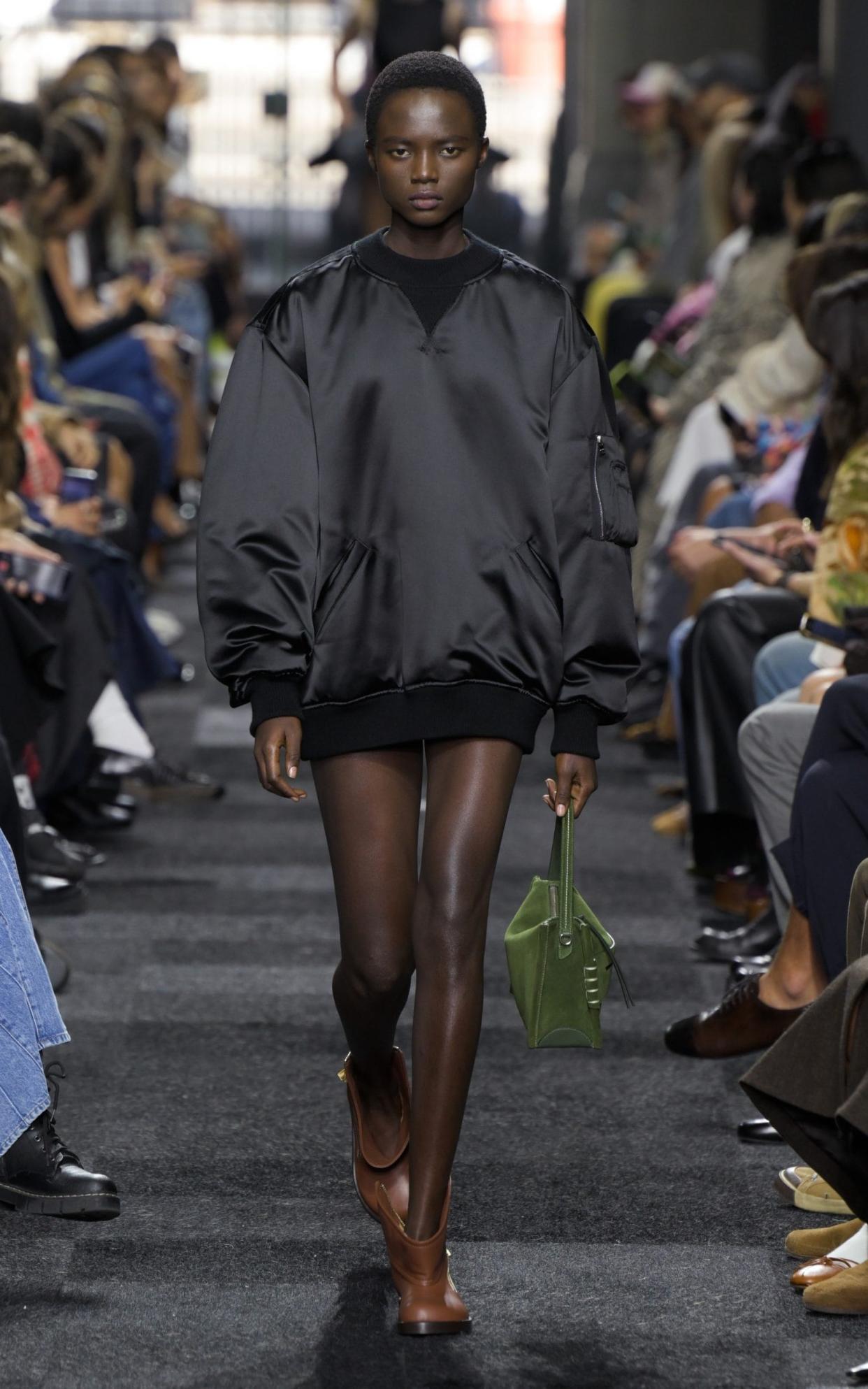 At JW Anderson, satin mini dresses took the form of jersey hoodies