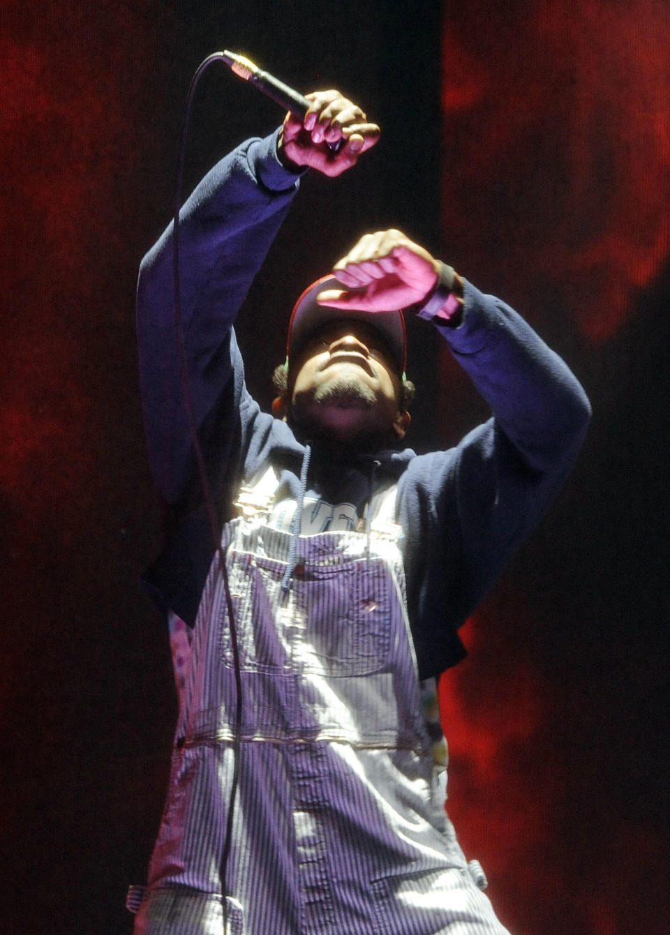 Andre 3000 of hip hop group Outkast performs during their headlining set on the first day of the 2014 Coachella Music and Arts Festival on Friday, April 11, 2014, in Indio, Calif. (Photo by Chris Pizzello/Invision/AP)