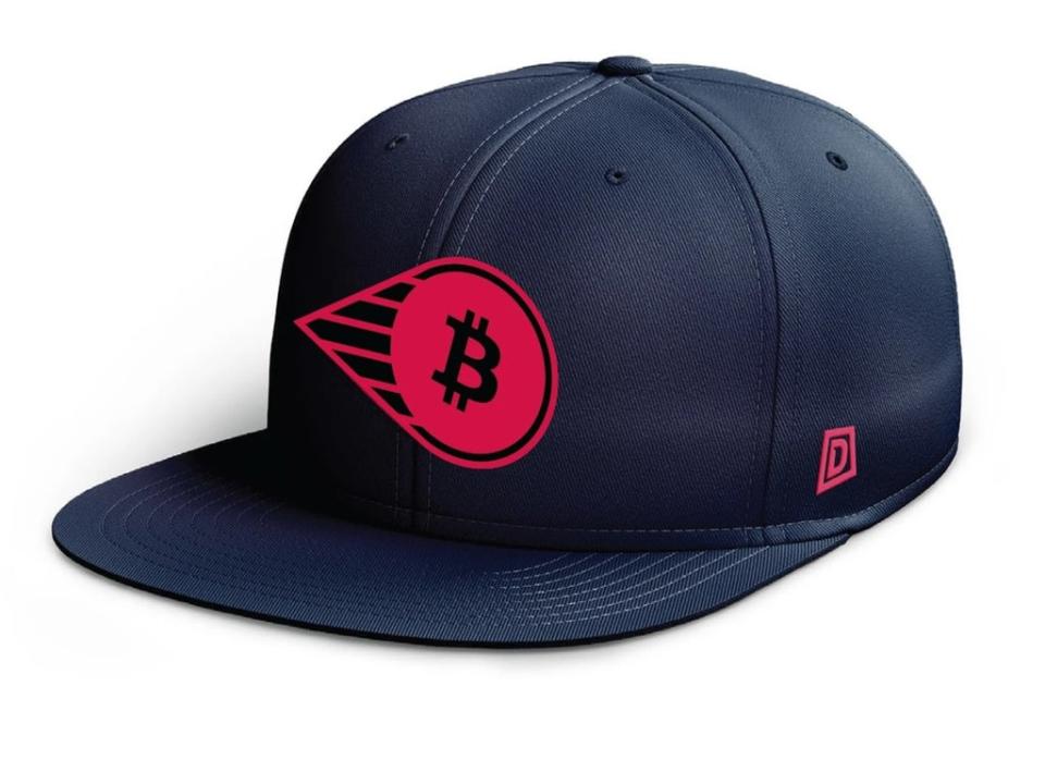 A baseball cap with the bitcoin symbol imposed on the Perth Heat logo is among the merchandise on offer in the club’s online store (Perth Heat)