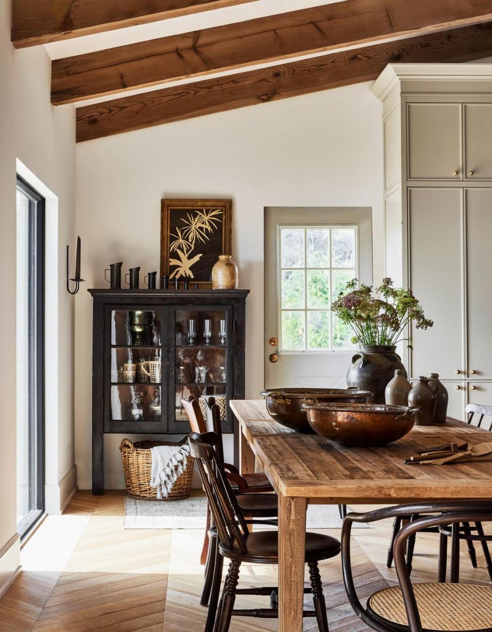 dining room in lake simcoe, ontario, with a collection of antiques designed by ashley montgomery antique chairs, antique furniture, antique hutch