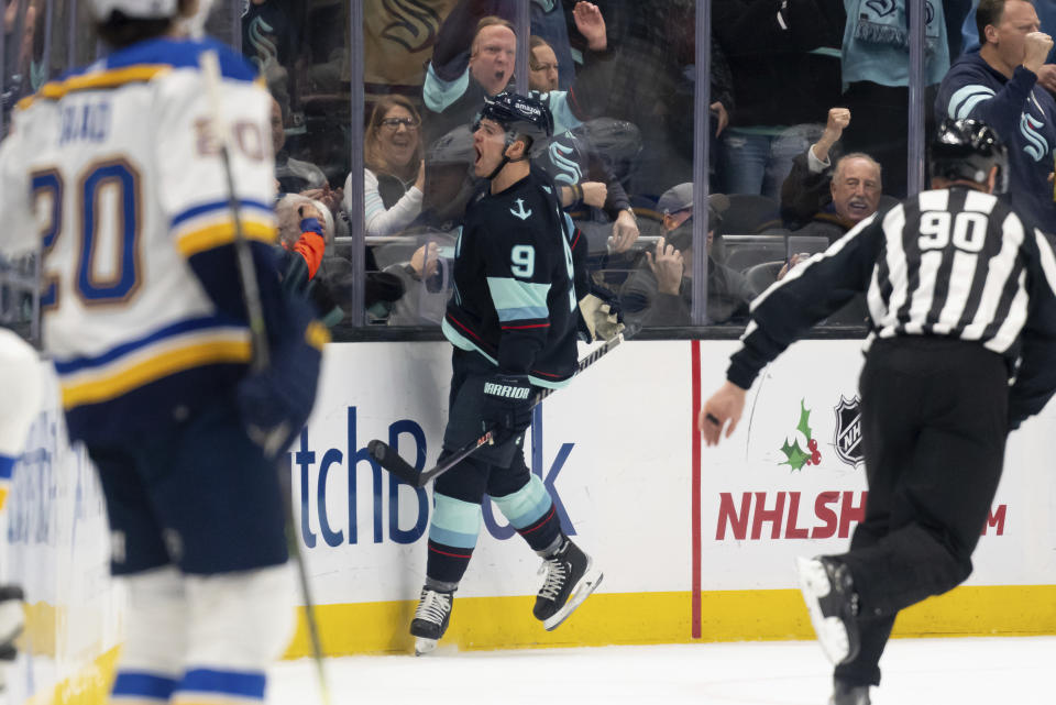 Seattle Kraken forward Ryan Donato celebrates after scoring a goal against the St. Louis Blues during the first period of an NHL hockey game Tuesday, Dec. 20, 2022, in Seattle. (AP Photo/Stephen Brashear)