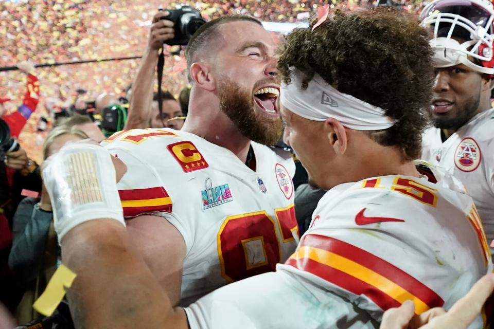 Kansas City Chiefs tight end Travis Kelce, left, and quarterback Patrick Mahomes celebrate.