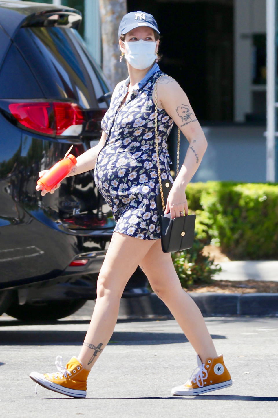 <p>Mom-to-be Halsey lets her bump lead the way while out in Los Angeles on June 11. </p>