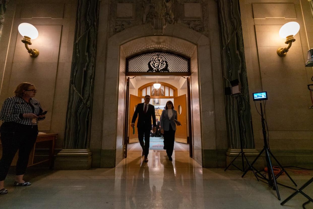 Premier of Saskatchewan Scott Moe and Leader of the Opposition Carla Beck spent three hours in debate on Wednesday in what served as a mini-preview of the upcoming election campaign. (Heywood Yu/The Canadian Press - image credit)