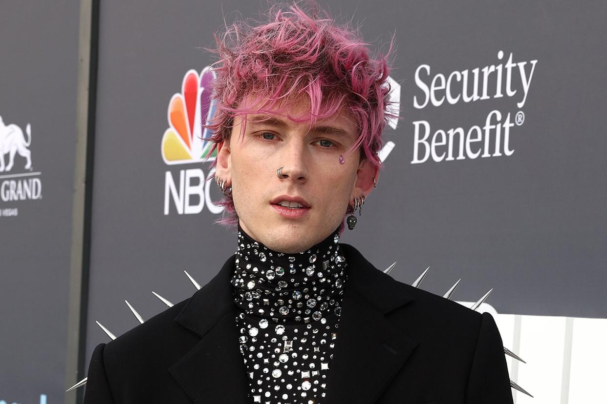 Machine Gun Kelly arrives to the 2022 Billboard Music Awards held at the MGM Grand Garden Arena on May 15, 2022.