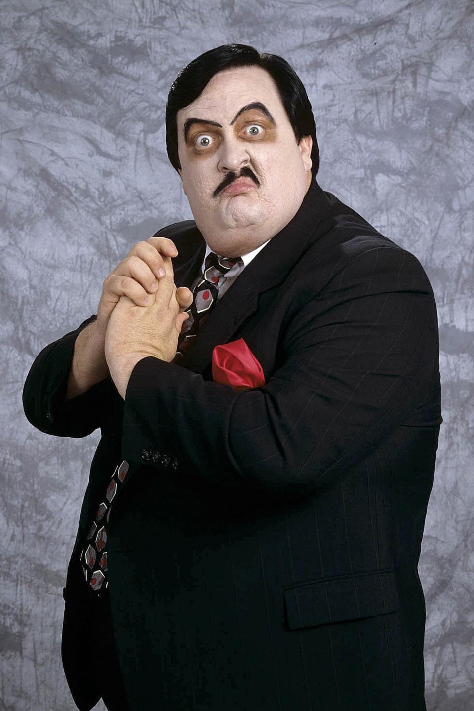 This undated photo released Wednesday, March 6, 2013, by WWE, Inc. shows William Moody, aka Paul Bearer, the pasty-faced, urn-carrying manager for performers The Undertaker and Kane. A spokesman for the wrestling circuit said Moody's family contacted the WWE to report his death on Tuesday, March 5, 2013. He was 58. No cause was released. (AP Photo/WWE Inc.)