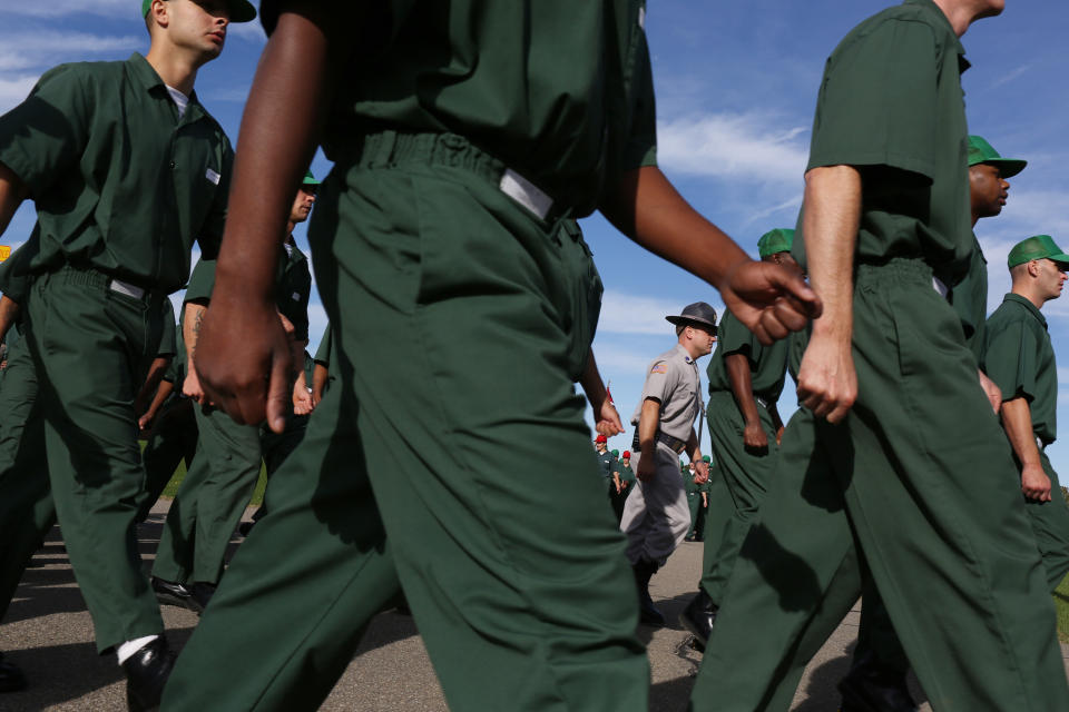 Prisoners serve their sentences at a camp prison 