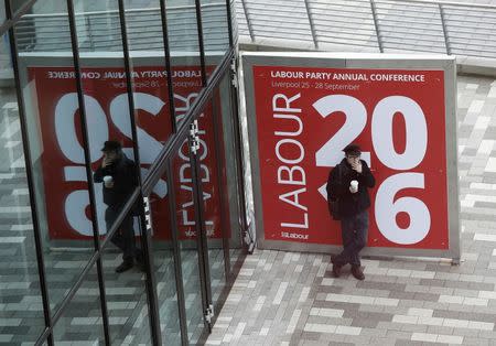 A deligate smokes during the second day of the Labour Party conference in Liverpool, Britain, September 26, 2016. REUTERS/Darren Staples