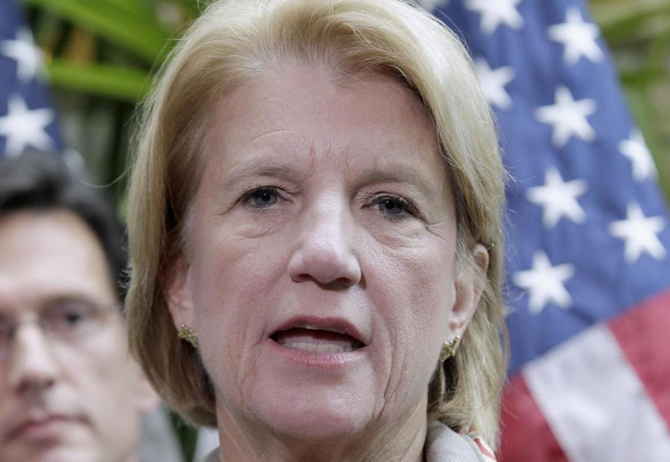 FILE - This Sept. 21, 2011 file photo shows Rep. Shelley Moore Capito, R-W.Va. speaking on Capitol Hill in Washington. Deciding which party controls the U.S. Senate for the final two years of President Barack Obama’s tenure could come down to women _ both the handful who are running in significant races and the moderate female voters who often tip close elections. (AP Photo/J. Scott Applewhite, File)