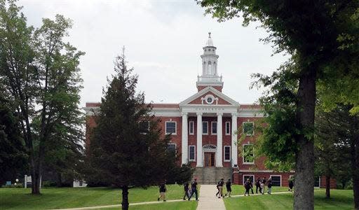 In this July 9, 2015 photo, members of the Vermont Geographic Alliance walk across campus at Castleton State College in Castleton, Vt., where they are attending a summer institute. The college seeks to change its name to Castleton University to reflect its growth in graduate programs and to attract more out-of-state and foreign students. (AP Photo/Lisa Rathke)