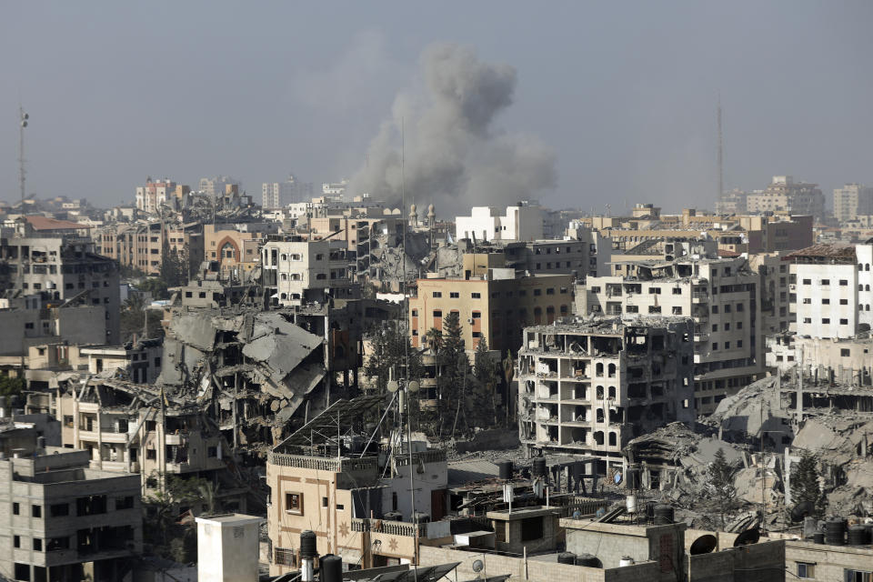 FILE - Smoke rises following Israeli airstrikes on Gaza City, Thursday, Nov. 9, 2023. Israel's military offensive has turned much of northern Gaza into an uninhabitable moonscape. When the war ends, any relief will quickly be overshadowed by the dread of displaced families for their future. (AP Photo/Abed Khaled, File)
