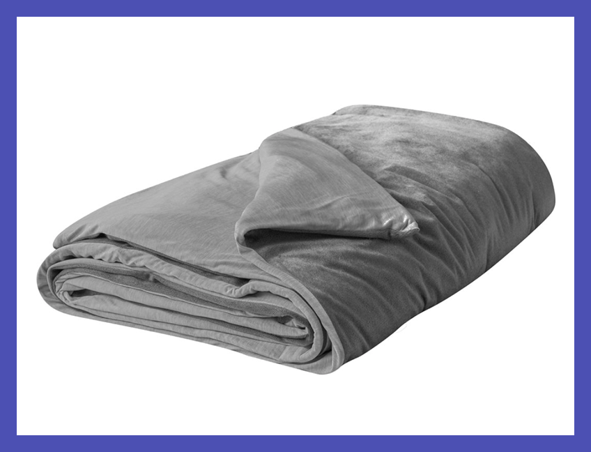 Tranquility now: There's no sleep like a weighted-blanket sleep. (Photo: Walmart)