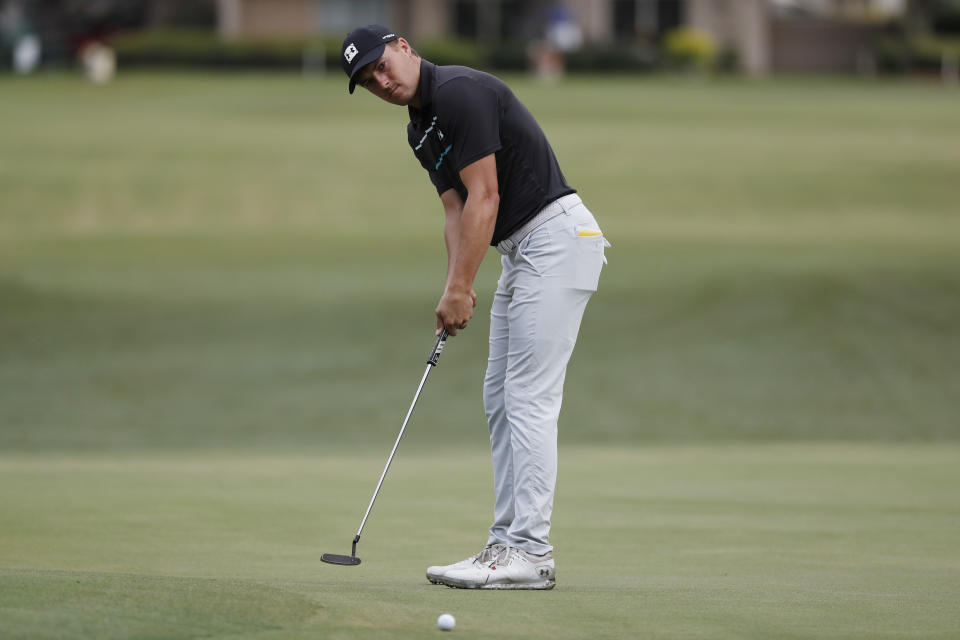 Jordan Spieth putts on the 10th green during the first round of the RBC Heritage golf tournament, Thursday, June 18, 2020, in Hilton Head Island, S.C. (AP Photo/Gerry Broome)