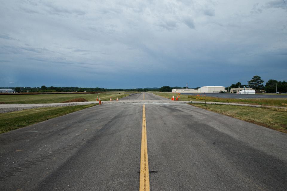 A strip of taxi lane runs parallel to runway construction at the Maury County Airport in Mount Pleasant, Tenn. on Wednesday, June 14, 2023