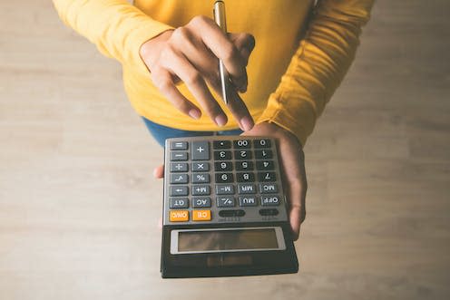 <span class="caption">Calculating how the budget will affect your finances.</span> <span class="attribution"><a class="link " href="https://www.shutterstock.com/image-photo/woman-entrepreneur-using-calculator-pen-her-710912206" rel="nofollow noopener" target="_blank" data-ylk="slk:Atstock Productions/Shutterstock;elm:context_link;itc:0;sec:content-canvas">Atstock Productions/Shutterstock</a></span>