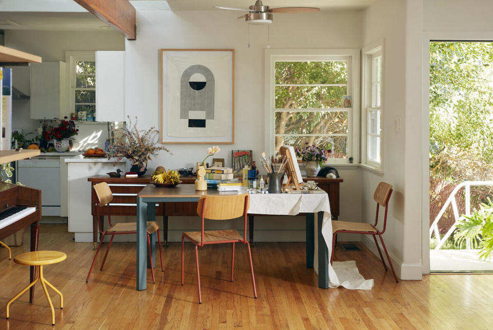 The Solid Dining Table in Green Hammertone and School Chairs in Rust by Rad