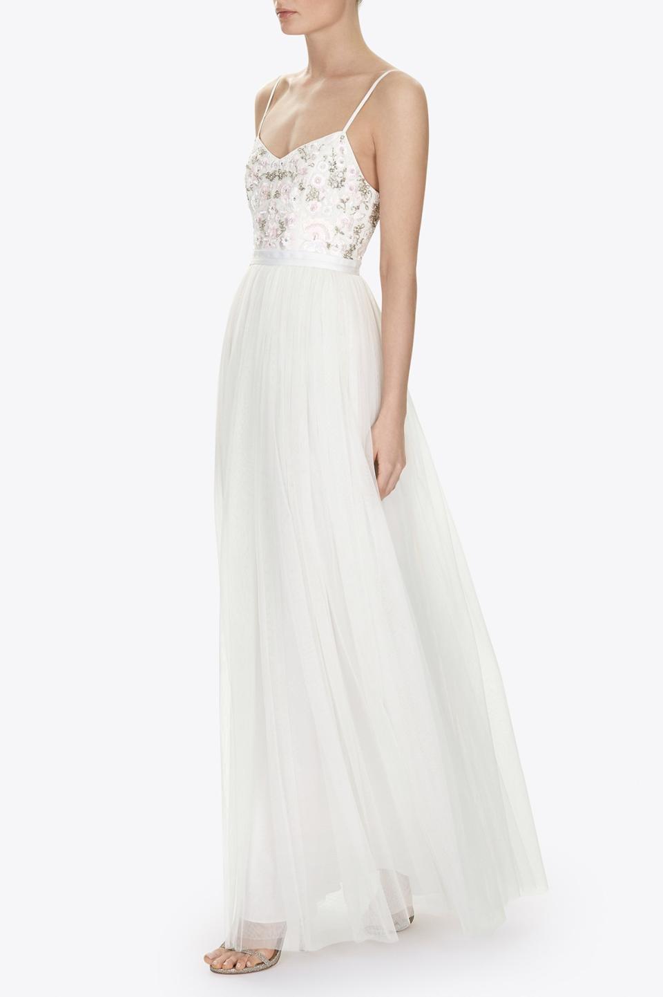 <p><a rel="nofollow noopener" href="http://www.needleandthread.com/index.php/uk/all-bridalwear/trailing-tulle-maxi-dress" target="_blank" data-ylk="slk:Needle & Thread, £275;elm:context_link;itc:0;sec:content-canvas" class="link "><i>Needle & Thread, £275</i></a> </p>