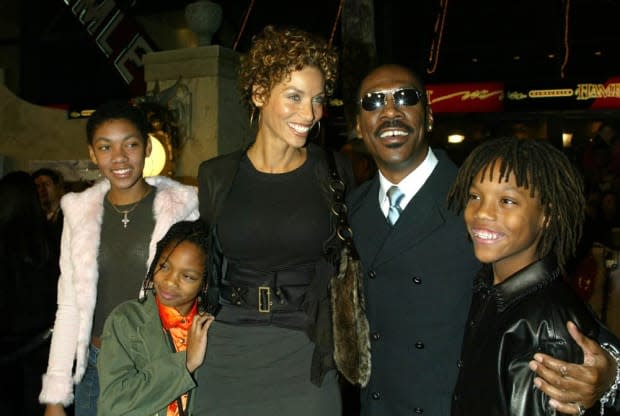 <p>Eddie Murphy, his wife Nicole and their children Brea, 14, (left), Shayne, 9, and Miles, 11 (right) arrive at the premiere of "The Haunted Mansion" in 2003.</p>