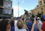 CHICAGO, IL - AUGUST 10: Fans take photos of a statue of former Chicago Cub player and broadcaster Ron Santo which was unveiled outside of Wrigley Field before a game between the Cubs and the Washington Nationals on August 10, 2011 in Chicago, Illinois. (Photo by Jonathan Daniel/Getty Images)