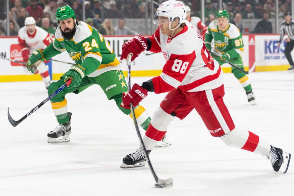 Red Wings right wing Patrick Kane shoots and scores against the Wild in the first period of the Wings' 6-3 loss on Wednesday, Dec. 27, 2023, in St. Paul, Minnesota.