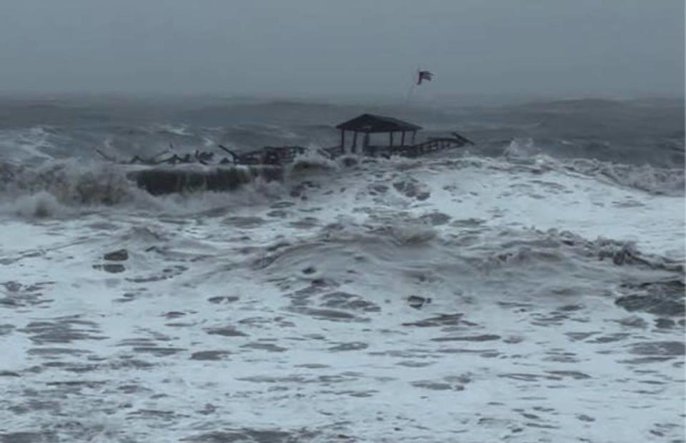 The end of the Pawleys Island pier has collapsed and is floating south.