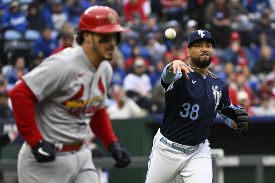 Kansas City Royals relief pitcher Joel Payamps throws out St. Louis Cardinals' Nolan Arenado during the third inning of a baseball game, Wednesday, May 4, 2022 in Kansas City, Mo. (AP Photo/Reed Hoffmann)