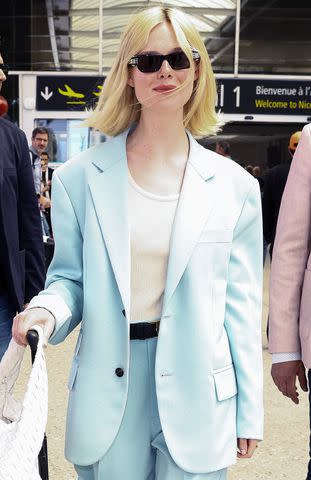 <p>Marc Piasecki/GC Images</p> Elle Fanning arriving at Cannes 2024