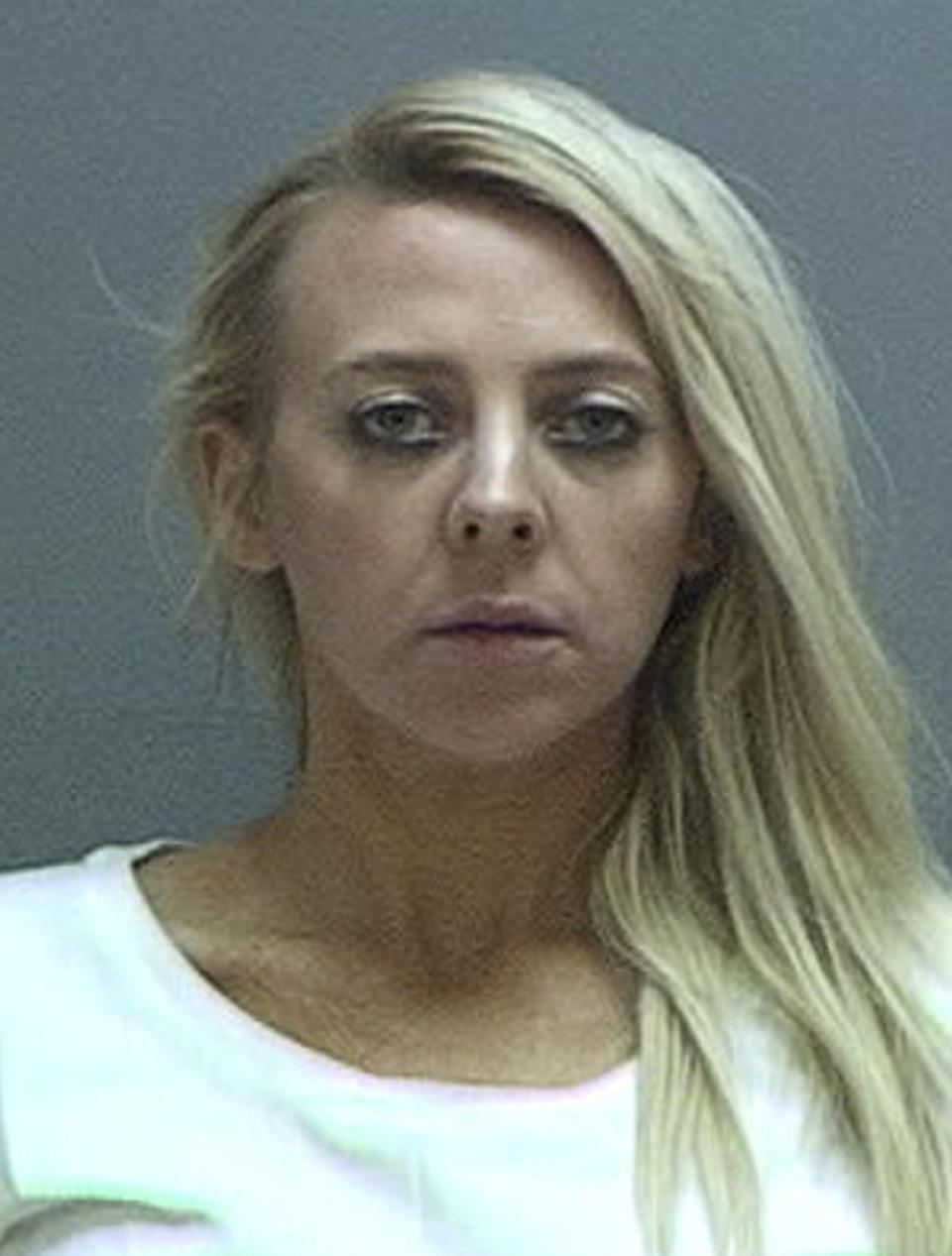 This undated photo provided by the Salt Lake County Sheriff's Office shows Chelsea Watrous Cook. Police say Cook, a Utah high school teacher, shot and killed her ex-husband's girlfriend while the former couple's children looked on. (Salt Lake County Sheriff's Office via AP)