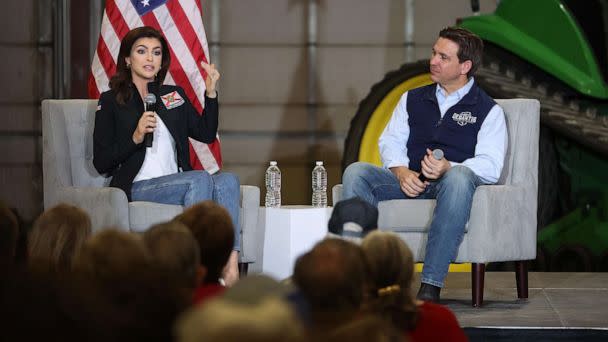 PHOTO: Republican presidential candidate Florida Governor Ron DeSantis listens a his wife Casey speaks during a campaign rally at Port Neal Welding Company, on May 31, 2023, in Salix, Iowa. (Scott Olson/Getty Images)