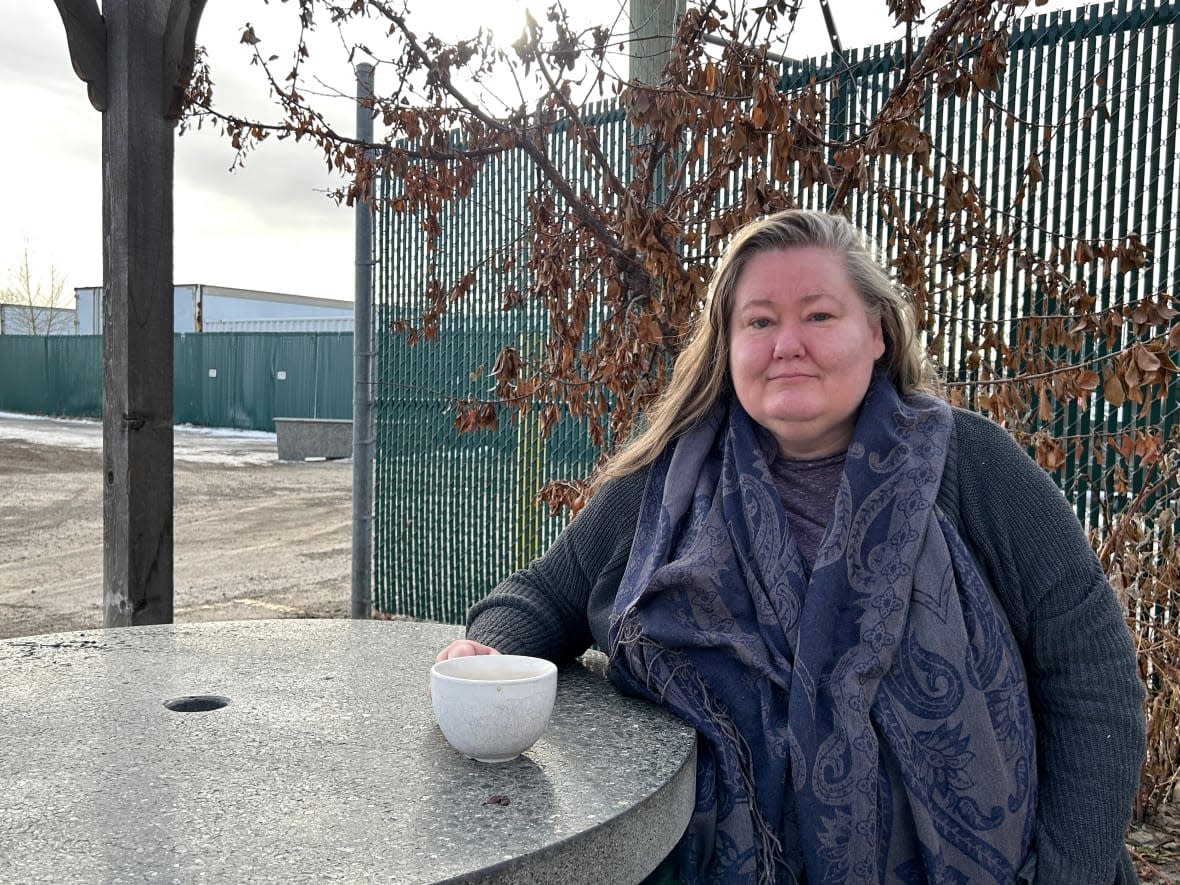 Christina Mann, 52, has lived in a string of lodging houses with strangers in Calgary. She says she wants the City of Calgary to do more to tackle housing affordability. (Karina Zapata/CBC - image credit)