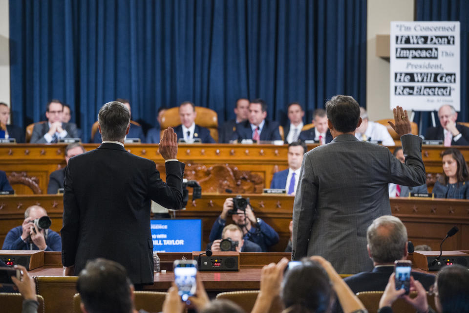 Top U.S. diplomat in Ukraine William Taylor, left, and Career Foreign Service officer George Kent are sworn in prior to testifying before the House Intelligence Committee on Capitol Hill in Washington, Wednesday, Nov. 13, 2019. (Photo: Jim Lo Scalzo/Pool Photo via AP)