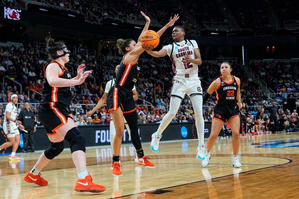 South Carolina Gamecocks guard MiLaysia Fulwiley (12) shoots a layup against Oregon State Beavers guard Donovyn Hunter (4) during the second half in the finals of the Albany Regional of the 2024 NCAA Tournament at MVP Arena March 31, 2024, in Albany, New York.