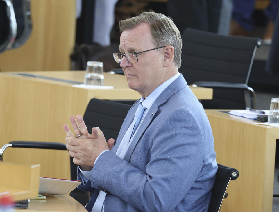 Bodo Ramelow, Prime Minister of Thuringia, sits in his seat in the plenary chamber after the vote in Erfurt, Germany, Friday, July 23, 2021. The far-right Alternative for Germany party failed in an attempt Friday to unseat the left-wing governor of an eastern German state, a long-shot bid that opponents denounced as political theater. (Bodo Schackow/dpa via AP)