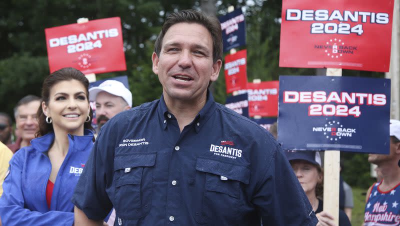 Republican presidential candidate and Florida Gov. Ron DeSantis and his wife Casey walk in the Fourth of July parade on July 4, 2023, in Merrimack, N.H.