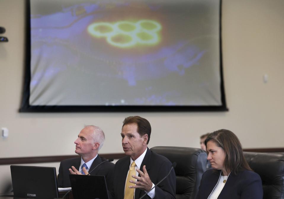 Darren Hughes, bid lead for the Salt Lake City-Utah Committee for the Games, left, Fraser Bullock, committee president and CEO, and Catherine Raney Norman, committee chairwoman, speak during the first meeting of Utah Legislature’s Olympic Coordination Committee at the Capitol in Salt Lake City on Thursday, June 15, 2023. | Laura Seitz, Deseret News