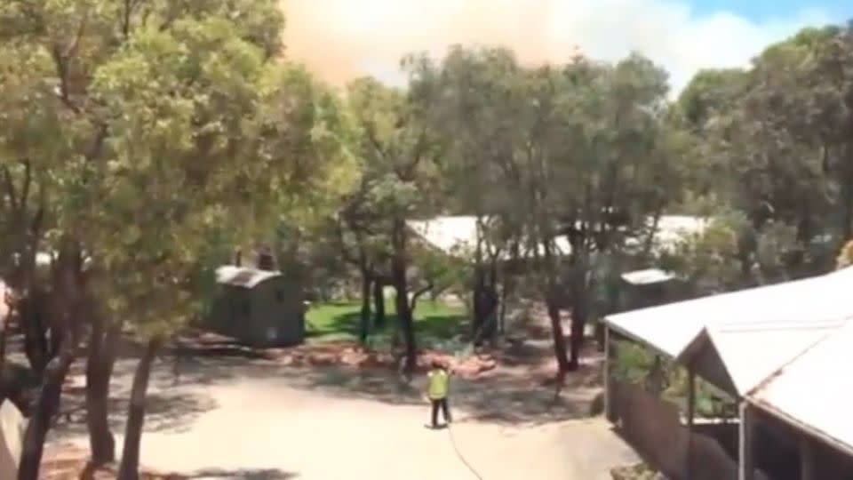 Students in a lockdown at a Perth school have recorded the blaze heading closer to the grounds.