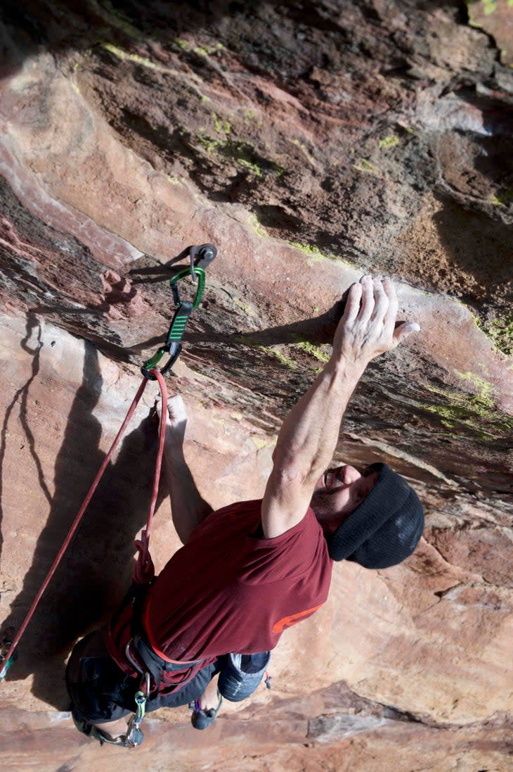 <span class="article__caption">The author gets an attentive belay on Nephron (5.13+), Hillbilly Rock, Flatirons, Colorado, in 2020. </span> (Photo: Ryan Pecknold)