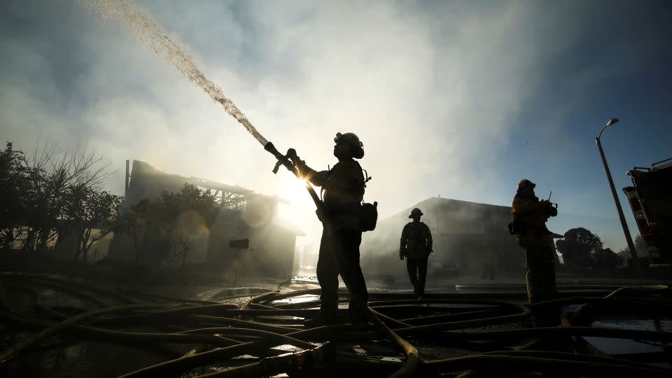 Firefighters respond to the Sycamore Fire in Whittier, California, in 2022. Insurers are pulling out of California because of wildfire risks. - David Swanson/Reuters