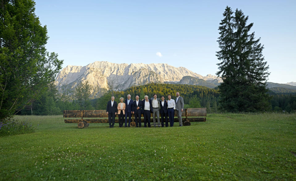 Group of Seven leaders pose during a group photo at the G7 summit at Castle Elmau in Kruen, near Garmisch-Partenkirchen, Germany, on Sunday, June 26, 2022. The Group of Seven leading economic powers are meeting in Germany for their annual gathering Sunday through Tuesday. From left, Italy's Prime Minister Mario Draghi, European Commission President Ursula von der Leyen, U.S. President Joe Biden, German Chancellor Olaf Scholz, British Prime Minister Boris Johnson, Canada's Prime Minister Justin Trudeau, Japan's Prime Minister Fumio Kishida, French President Emmanuel Macron and European Council President Charles Michel. (AP Photo/Markus Schreiber, Pool)