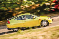 <p>Along with the <strong>Toyota Prius</strong>, the first-generation Insight was one of the first modern petrol-electric hybrid cars. Honda was not intending to shock anyone with it – on the contrary, this was a serious experiment in reducing the use of fossil fuels as far as possible.</p><p>However, Honda went further than Toyota in <strong>reducing aerodynamic drag</strong>. There was a sober purpose to it, but with its low-drag shape and partially shrouded rear wheels the Insight had a more startling appearance even than the NSX, and was arguably the craziest-looking car the company has ever put on sale.</p>