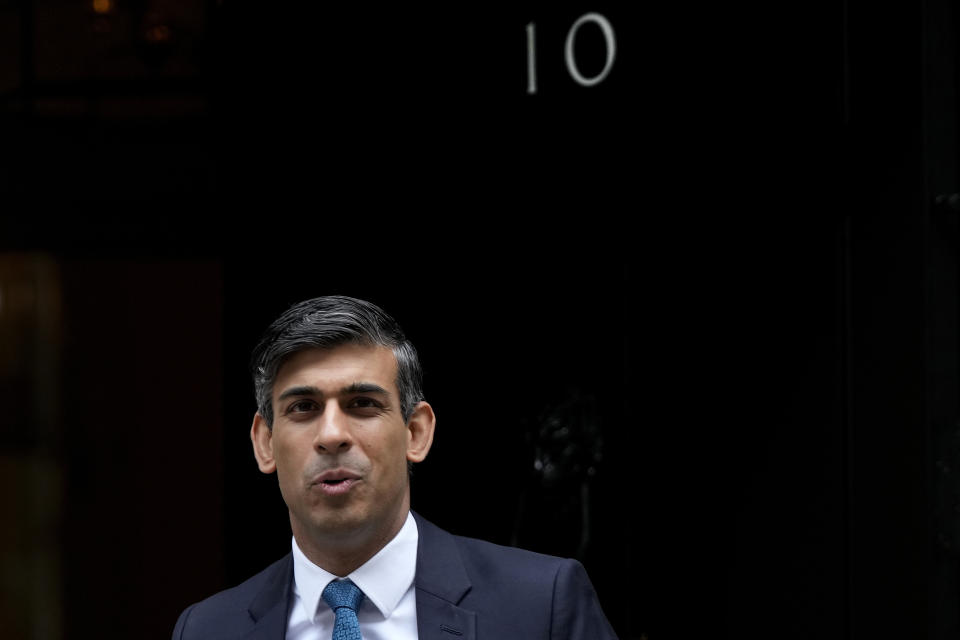 FILE - Britain's Prime Minister Rishi Sunak leaves 10 Downing Street to attend the weekly Prime Ministers' Questions session in parliament in London, on July 19, 2023. British lawmakers headed back to Parliament on Monday Sept. 4, 2023 after their summer break. But thousands of U.K. children won’t be returning to their classrooms this week, because their schools are at risk of collapse from crumbling concrete. (AP Photo/Frank Augstein, File)