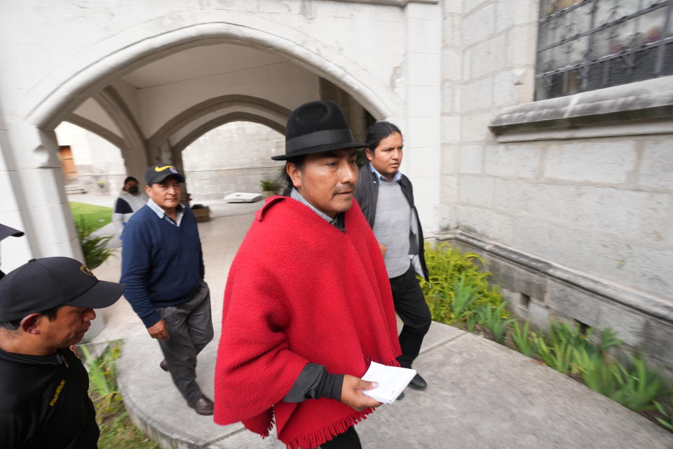 Indigenous leader Leonidas Iza arrives to the Basilica del Voto where dialogue with the government broke down in downtown Quito, Ecuador, Tuesday, June 28, 2022. (AP Photo/Dolores Ochoa)